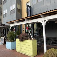 Exterior - lots of outdoor seating  at Busboys and Poets - Carroll St in Washington
