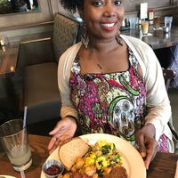 Enjoying a tofu scramble, home fries, and a vegan scramble at Busboys and Poets in Takoma. at Busboys and Poets - Carroll St in Washington