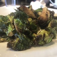 Crispy brussel sprouts 😋  at Busboys and Poets - Carroll St in Washington