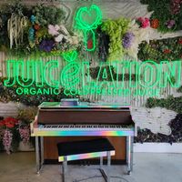 Little kid was playing piano when we came in at Juicelation in Naples