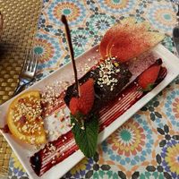 Vegan and gluten free coconut chocolate slice at Caos in Ibiza