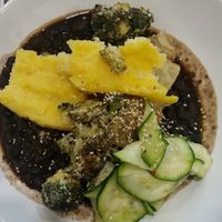 Balkan prebranch, grilled broccoli with tahini, celery purée, baked polenta, zucchini salad with chilli at Veggie Garden in Prague