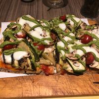 Grilled zucchini and aubergine on pizza. Mozzarella —vegan— on top! at Pizza Pala Romana in Bangkok