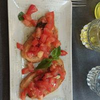Bruchetta's (without ham. The chef gif me 2 instead of 1 with ham) at Quinoa in Florence