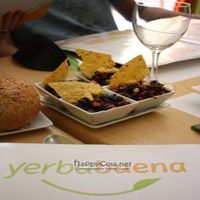 This was the free starter that every table got once they arrived. It was an amazing cold wild rice salsa with one nacho chip. Delicious! at Yerbabuena - Bordadores in Madrid