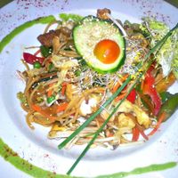Oriental-style noodles with seitan, tofu, vegetables and vegetables  at Yerbabuena - Bordadores in Madrid