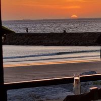 View oc the sunset from in the restaurant. at Marcelino Beach Club in Costa Da Caparica