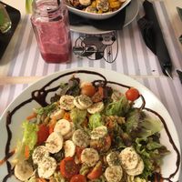 Tropical salad without cheese and açai bowl  at Marcelino Beach Club in Costa Da Caparica