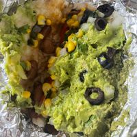 Taco with beans, pesto, olives, guacamole, corn salsa, ricee  at Illegal Pete's in Greenwood Village