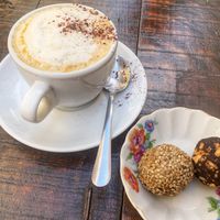 Coffee with soy-milk and bliss balls (peanut-choc, halva)  at Gugar in Valletta