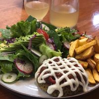 Quinoa party with salad and fries in coconut oil. at Siembra in Lima