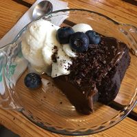 Chocolate cake with ice cream and blue berries at Siembra in Lima
