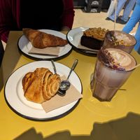 Apple cinnamon bread, croissant leftover from yesterday, peanut butter chocolate cake, and hot chocolates at Lost Weekend in Munich
