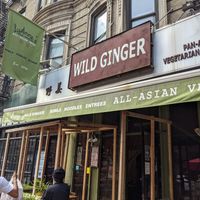 Outside. A few tables out on patio at LuAnne's Wild Ginger in New York City