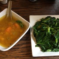 Pumpkin soup and steamed greens at LuAnne's Wild Ginger in New York City