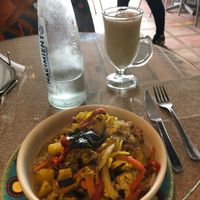 Curry veggie bowl and juice  at Namaste Restaurant in Guatape