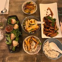 Left: fried xiaolongbao with smoked tofu, carrot, and zucchini filling; middle: mung bean starch noodles in spicy vinegar sauce; right: smoked tofu, rice. at Tianfuzius in Berlin
