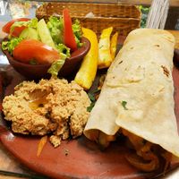 Veggie wrap with yuca fries and hummus at United Falafel Organization in Vilcabamba