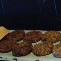 Grilling burgers at Vegan Vortex spring market.
 at Amazing Kale Burger in Evanston