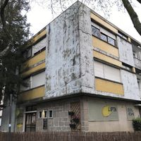 Unassuming, “Le Corbusier” building lured me in with its magnetic pull... at Lupin Restaurante Vegetariano in Porto