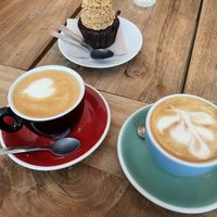 Peanutbutter cupcake with coffees with oat and sojamilk  at Brass Monkey in Vienna
