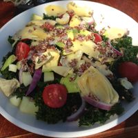 Kale salad with no cheese and extra dressing  at Cafe Verde in New Smyrna Beach
