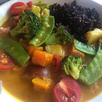 Must have Thai curry, also get the yuca fries cause they are so cheap and so good!!! at Cafe Verde in New Smyrna Beach