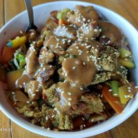 Stir-fry Rice bowl with falafel and peanut sauce at Wrap N Roll in San Juan Del Sur