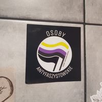 Non binary sticker in the mixed bathroom  at Vegan Ramen Shop - Finlandzka in Warsaw