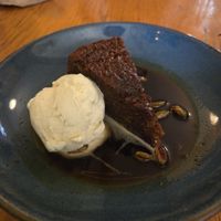 Cardamon and almond cake with chai syrup, pistachios and ice cream at The Waiting Room in Stockton-on-tees