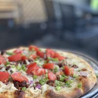 Chuck’s Bacon Ranch pizza on their patio at Allie's Vegan Pizzeria and Cafe in Spokane