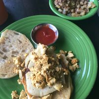 Breakfast sandwich and rosemary potatoes! at Allie's Vegan Pizzeria and Cafe in Spokane