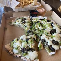 Pizza with gluten free crust, fries  at Allie's Vegan Pizzeria and Cafe in Spokane