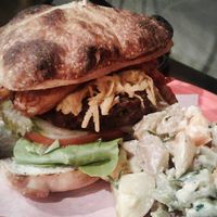 Bacon cheese burger with house made pattie, tempeh bacon, and cheddar  at Allie's Vegan Pizzeria and Cafe in Spokane