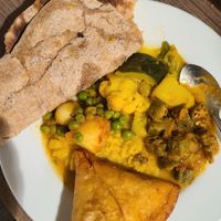 Vegan Thali with samosa at Namaste Nepal Restaurant in Grand Junction