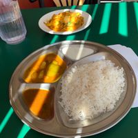 The cauliflower potato curry in the back.  at Namaste Nepal Restaurant in Grand Junction