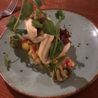 Pulled bbq celeriac, miniature bao buns, avocado puree, mango and lime salsa at Hortus in The Hague