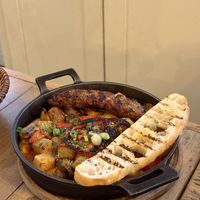 Slow roasted vegetables with sausage  at roots in Thessaloniki