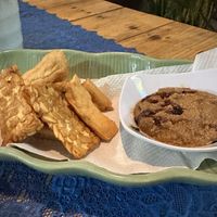 Tempeh tofu with sauce  at Wulan Vegetarian Warung in Ubud
