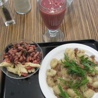 My lunch at Maran Vegan Bistro: Vegan gnocchi,Veggie sausage with sauce and Mache salad, with crudity: beans and pasta with onions :) at Maran Vegan Bistro in Vienna