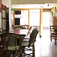 The interior of Andu Cafe - inside the cosy restaurant  Inside to outside view at Andu Caffe in East London