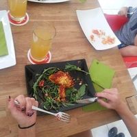 Polenta/tomato dish with arugula at triVida in Klagenfurt