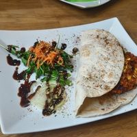 chili sin carne tortilla wrap. stuffed everything on plate inside and munched my way through it. full enjoy. at triVida in Klagenfurt