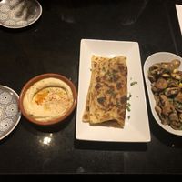Hummus, flatbread and mushroom starters at Oranaise Cafe in Leeds