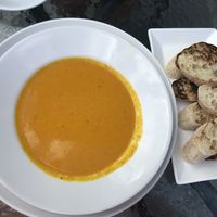 Coconut Carrot Ginger Soup with side of grilled bread  at Chef's Bistro in North Conway