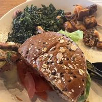Vegan double burger, kale salad and sweet potato hash  at True Food Kitchen in Atlanta