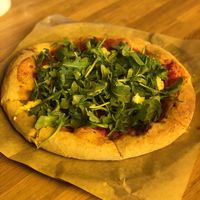 Arugula pizza with added vegan ricotta at True Food Kitchen in Atlanta