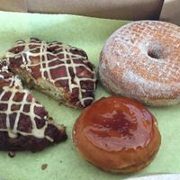 apple fritter, cinnamon sugar, and creme brûlée donuts at Donut Bar in San Diego