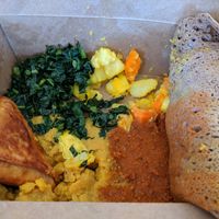 #3 takeout - spicy red lentils, yellow split peas, gommen kale & mixed vegetables with sambusas at Kaffa Ethiopian Cuisine in Berkeley