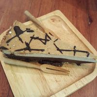 raw chocolate and salted caramel cake  at Backyard Cafe - Riverside in Phnom Penh